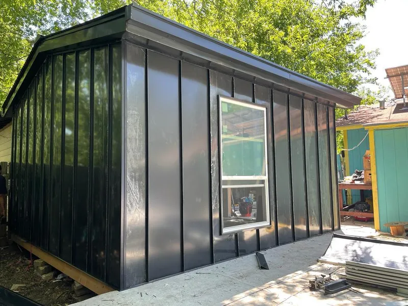 Black standing seam metal wall panels for Roof Inspection in Safety Harbor