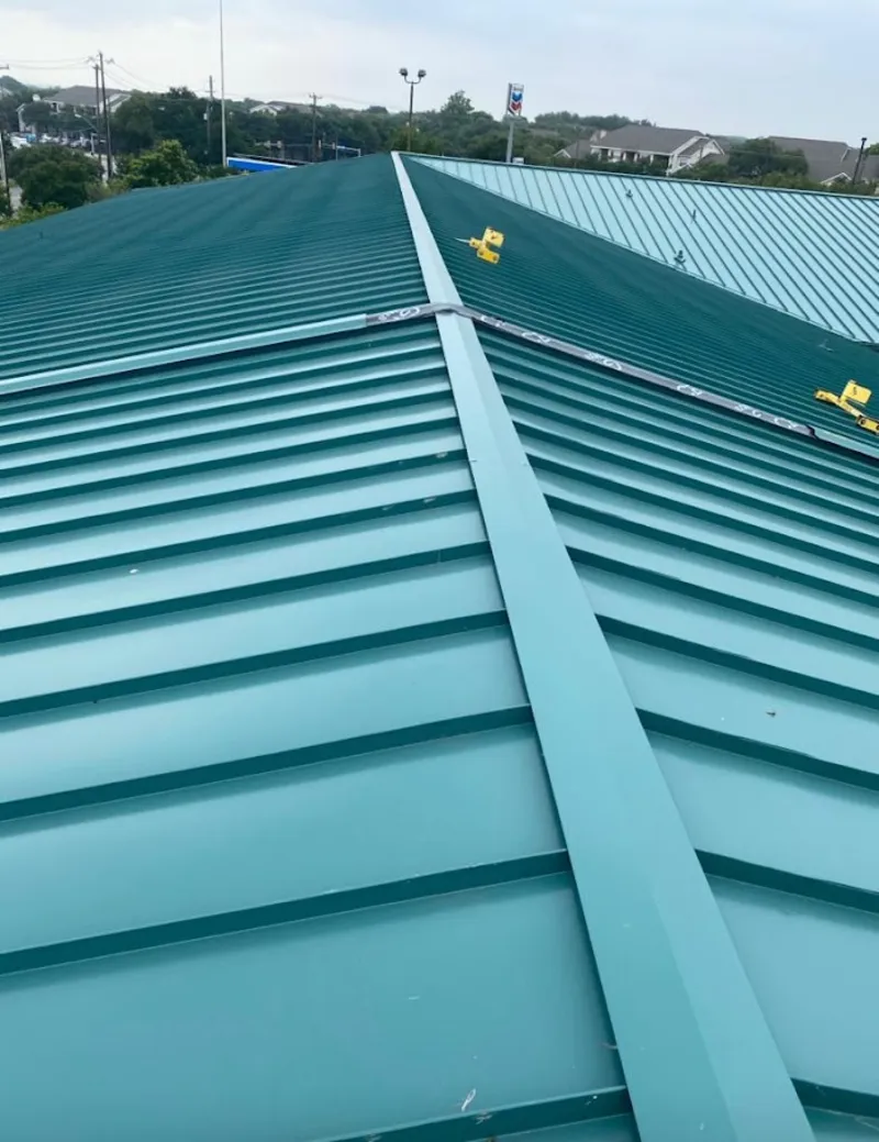 Green commercial metal roof ridge and valley for Metal Roof Repair in Safety Harbor
